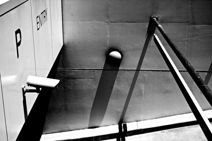 Gritty photo of entry into underground parking lot