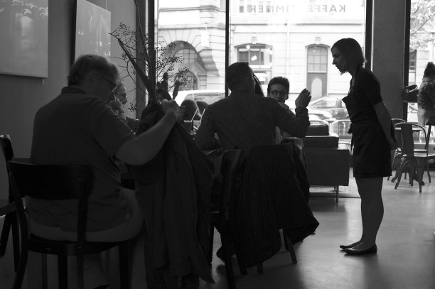 Photo of a waitress taking an order