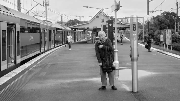 Photo of woman standing on Waitara platform